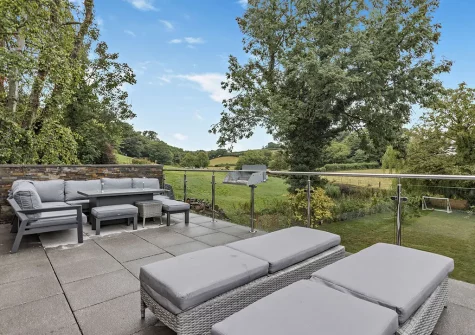 The patio, alfresco dining & outdoor sitting area at Dowr Gwel, Stratton