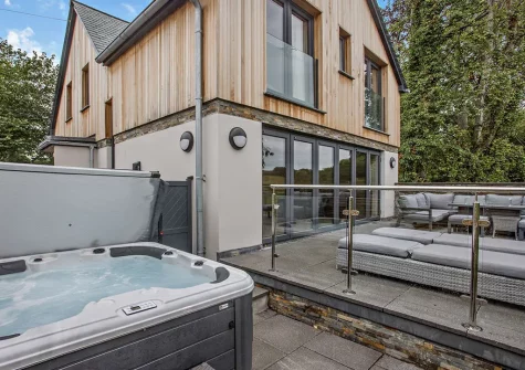 The hot tub,  patio & outdoor sitting area at Dowr Gwel, Stratton
