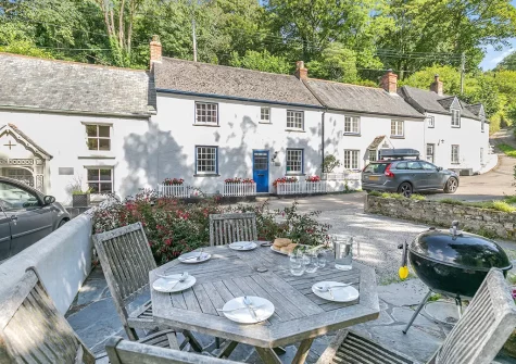 The patio, barbecue & alfresco dining area at Dowr Penty, Helford
