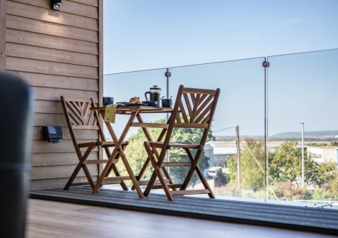The balcony & outdoor sitting area at Driftwood Barton Close, Instow