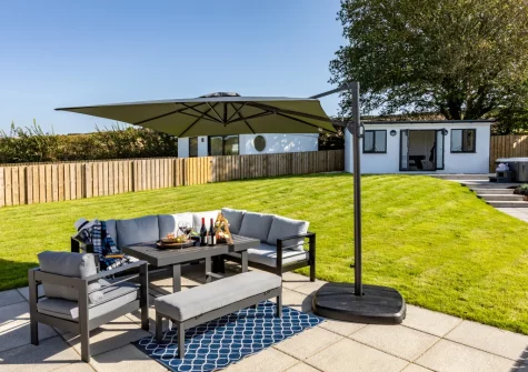 The patio, alfresco dining area & garden at Driftwood Barton Close, Instow