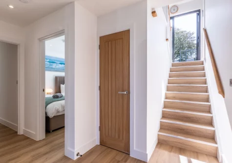 The stairs up to the first floor at Driftwood Barton Close, Instow