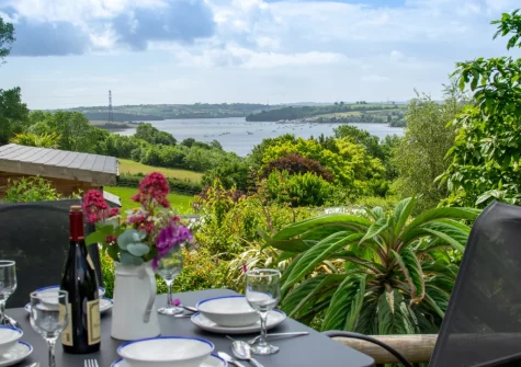 The wrap around deck & alfresco dining area at Driftwood Cottage, Bere Alston