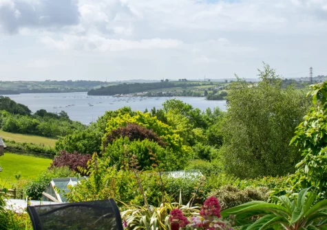 The fantastic river views from the wrap around deck & alfresco dining area at Driftwood Cottage, Bere Alston