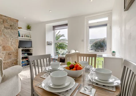 The dining area at Driftwood Cottage, Mousehole