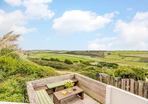 The patio & alfresco dining area at Driftwood, Mawgan Porth