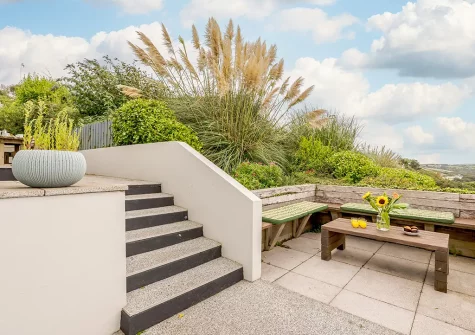 The patio & alfresco dining area at Driftwood, Mawgan Porth