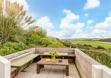 The patio & alfresco dining area at Driftwood, Mawgan Porth