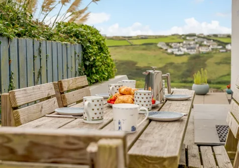 The patio & alfresco dining area at Driftwood, Mawgan Porth