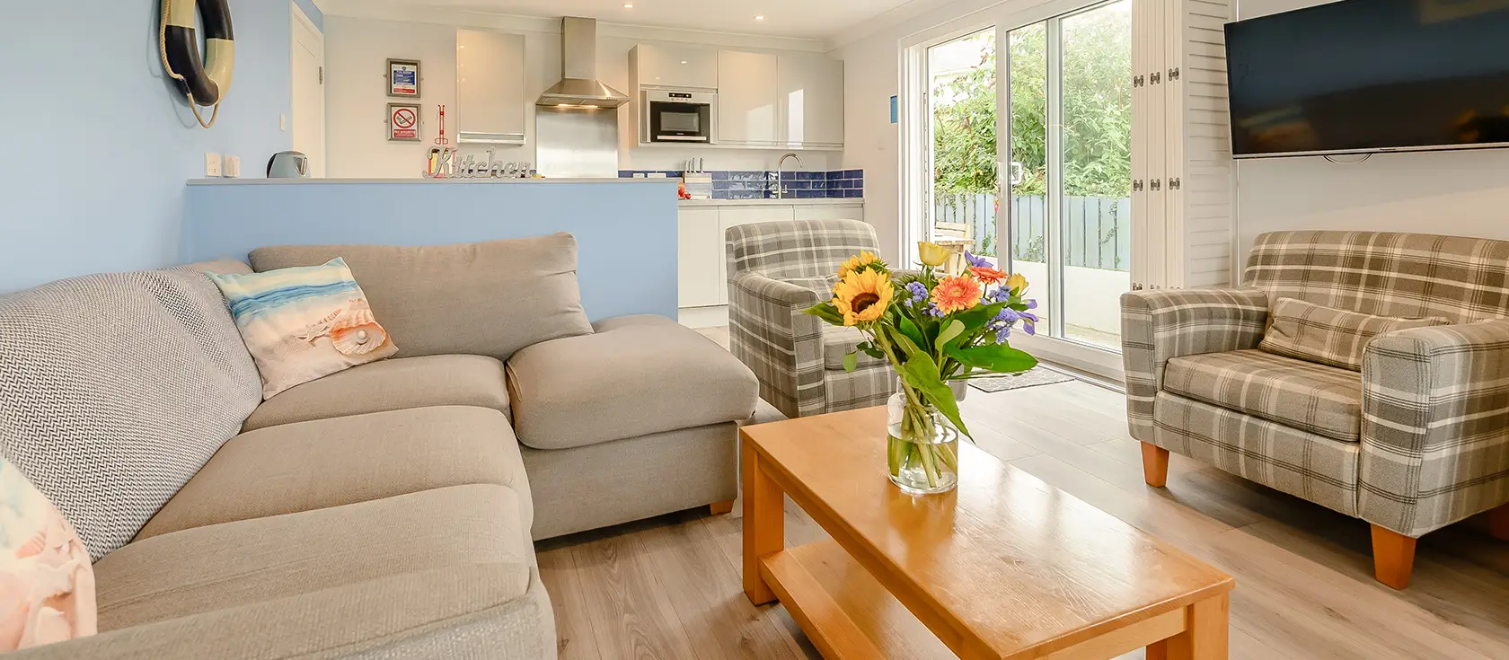 Driftwood, Mawgan Porth is a charming three-bedroom seaside apartment with dual patio areas offering both stunning sea and valley views. Just metres from the golden beach, it's perfect for families seeking unforgettable coastal adventures.