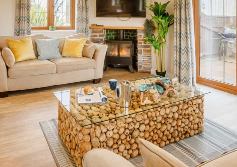 Duck Egg Cottage, Westward Ho! is a luxurious single-storey retreat on a private clifftop estate, featuring a six-person hot tub, direct coastal path access to golden beaches, and stunning sea views across North Devon's dramatic coastline.