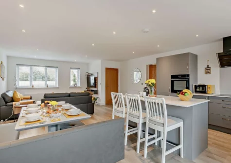 The kitchen & dining area at Dune Beachhouse, Westward Ho!