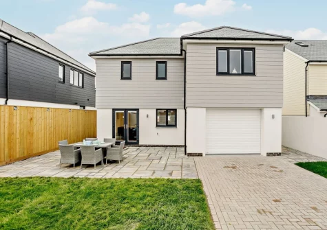 The patio, alfresco dining area & garden at Dune Beachhouse, Westward Ho!