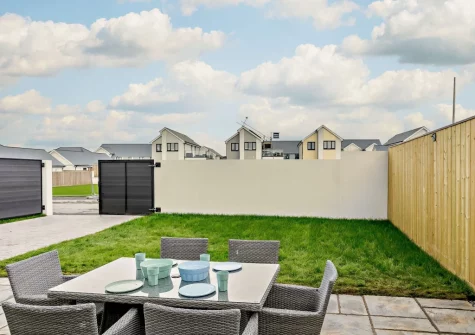 The patio, alfresco dining area & garden at Dune Beachhouse, Westward Ho!