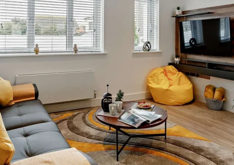 Dune Beachhouse, Westward Ho! is a stylish modern detached house near golden sands. Enjoy sea views from your private balcony, a games room, & an enclosed garden with BBQ. It's perfect for families and couples seeking the ideal seaside escape.