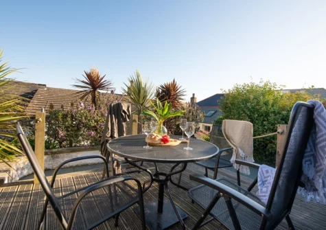 The sun-soaked terrace at Eastleigh Cottage, Marazion