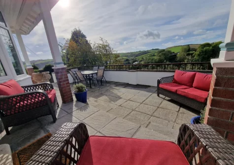 The patio & outdoor sitting area at Edgehill, Pentewan