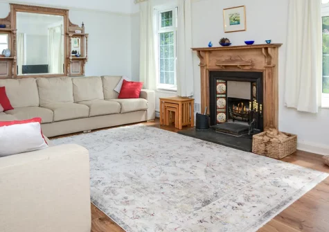 Edgehill, Pentewan is a spacious four-bedroom hillside house with stunning valley views, charming wood-fired pavilion, and direct coastal path access to the beach. Perfect for families seeking countryside serenity with seaside adventures.