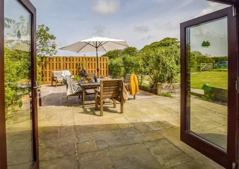 The patio, barbecue & alfresco dining area at Edistone Barn, Edistone