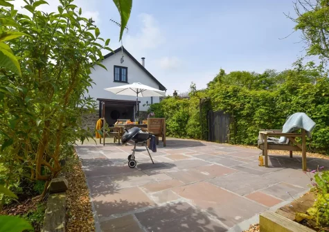 The patio, barbecue & alfresco dining area at Edistone Barn, Edistone