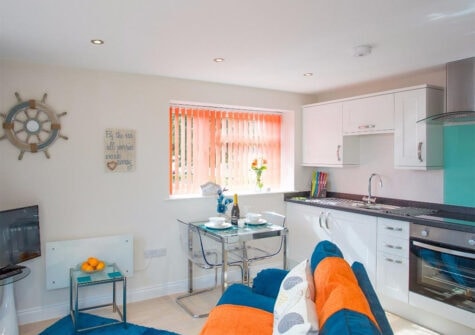 The open-plan living & dining area + kitchen at Egret, The Cove, Brixham