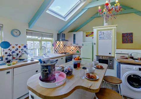 The kitchen & breakfast bar dining area at Eia's Loft, St Ives