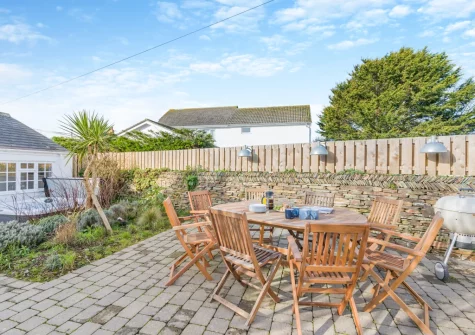 The patio, barbecue & alfresco dining area at Elmwood Cottage, Constantine Bay