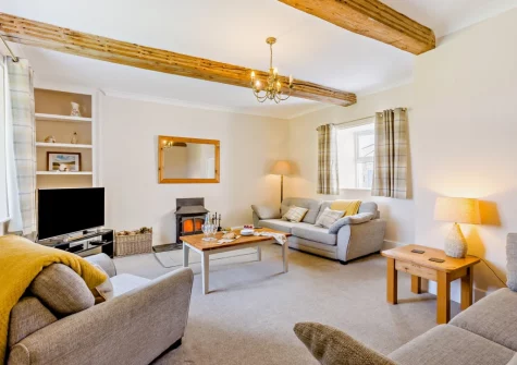 The living room at Estrayer Park Farmhouse, Meldon