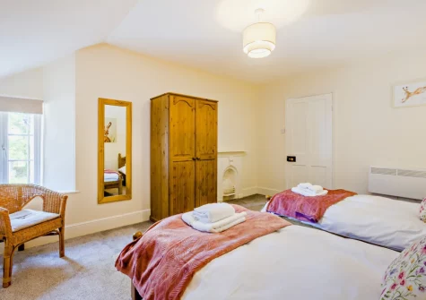 Bedroom #4 at Estrayer Park Farmhouse, Meldon