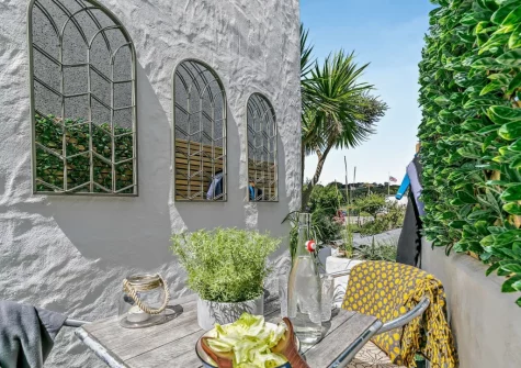 The patio terrace & alfresco dining area at Estuary Cottage, Hayle