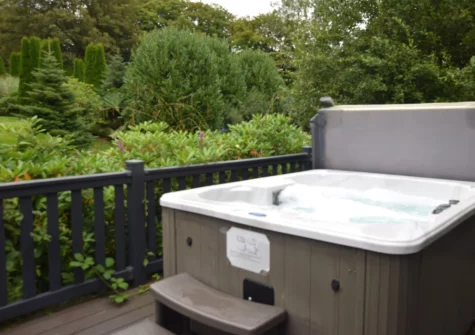 The decked patio & hot tub at Exmoor View at Kentisbury Grange, Kentisbury