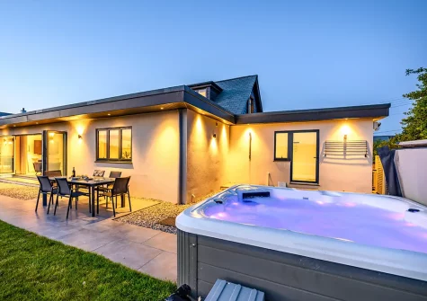 The patio, barbecue, alfresco dining area & hot tub at Fair Skies, St Merryn