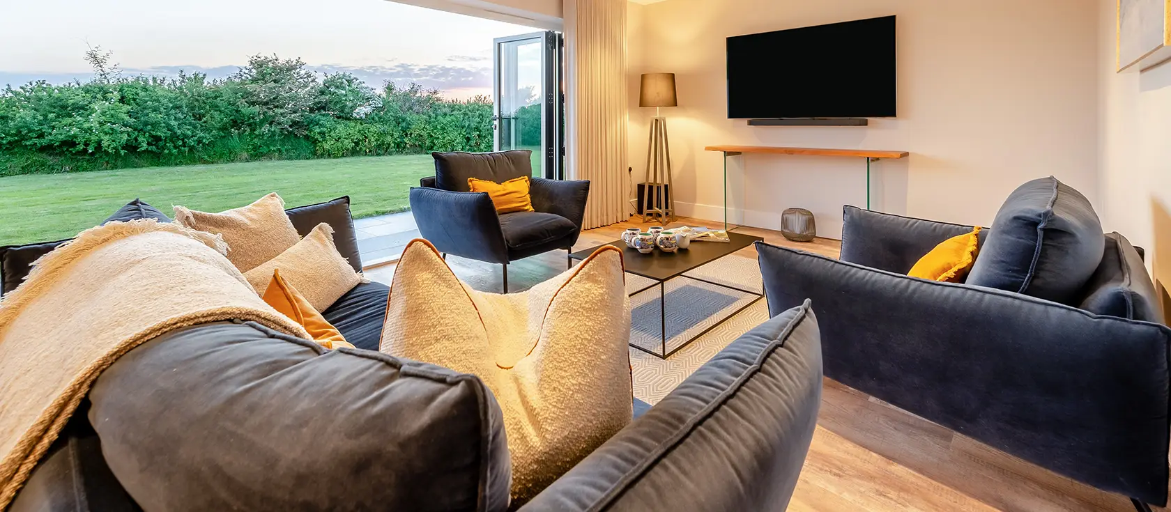 Fair Skies, St Merryn is a luxurious four-bedroom Scandi-inspired retreat featuring hot tub, designer interiors, and access to seven stunning beaches. Perfect for creating truly unforgettable family memories in beautiful North Cornwall.