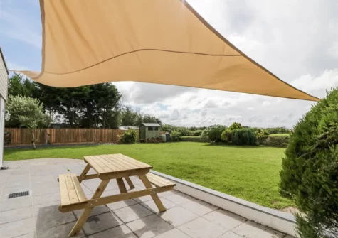 The patio, alfresco dining area & garden at Fairways, Bush