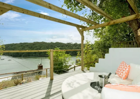 The decked patio & outdoor sitting area at Fal River Cottage, Malpas