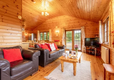 The living area at Falcon Lodge 12, Clovelly Lakes, Higher Clovelly