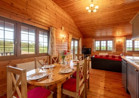 The dining area at Falcon Lodge 12, Clovelly Lakes, Higher Clovelly