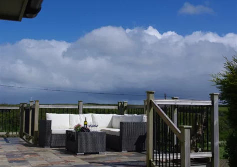 The patio & outdoor sitting area at Farmlands, Porthcothan
