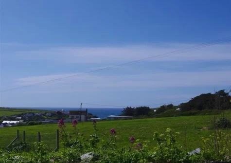 The view of the sea & surrounding countryside at Farmlands, Porthcothan