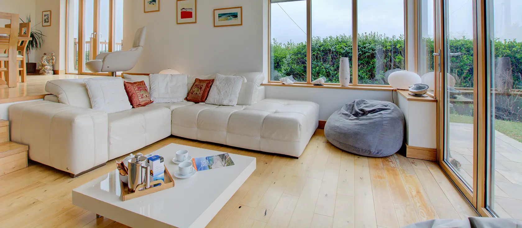 Farmlands, Porthcothan is an impressive single-storey retreat with three bedrooms and sea views. Featuring luxury bathrooms, a suspended wood burner, and panoramic countryside vistas, it's perfect for families seeking a Cornish coastal escape.