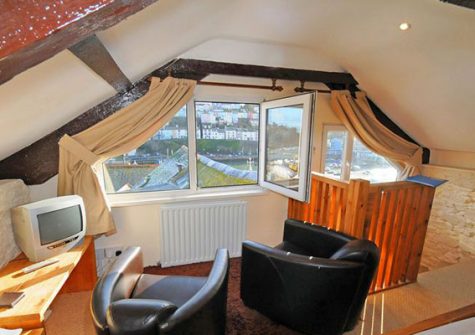 The seating area in bedroom #1 @ Farthing Cottage, Brixham