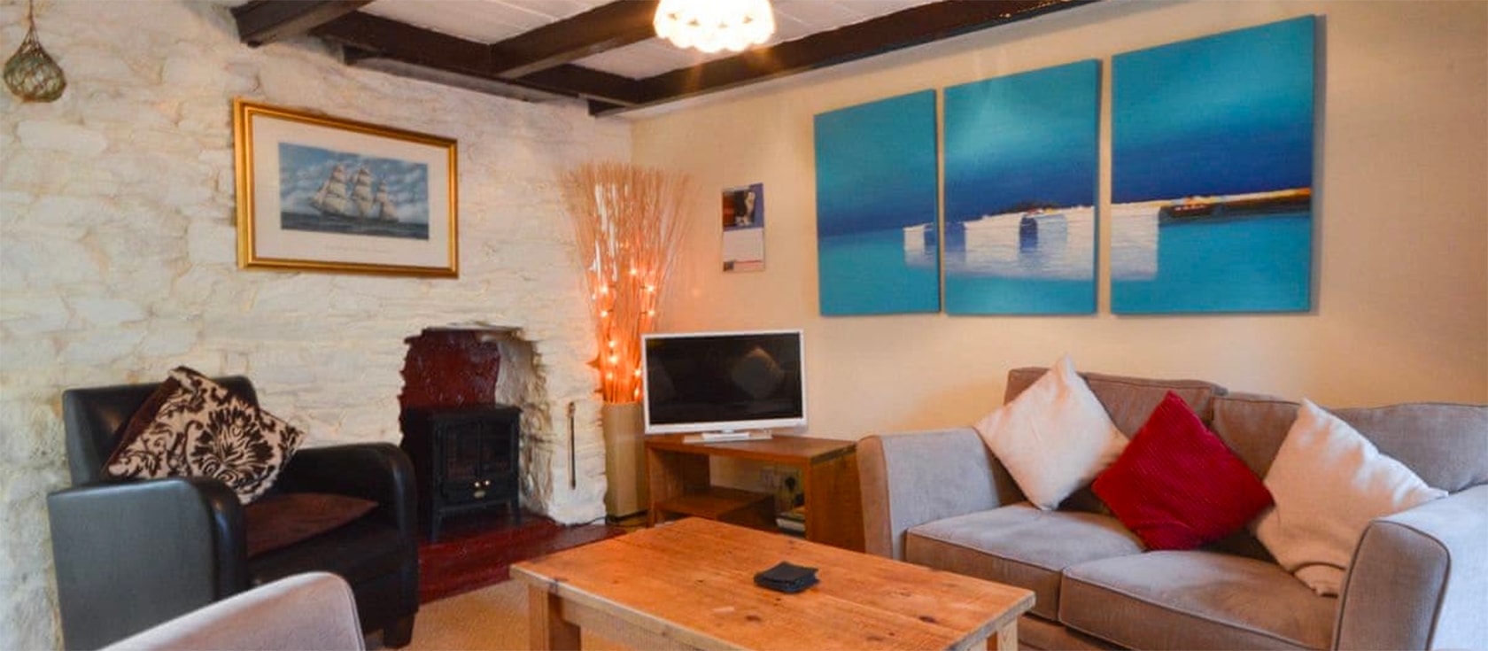 Farthing Cottage is a historic two bedroom cottage with views of Brixham Harbour. Accessed up a flight of steps, the accommodation is spread over three floors and includes a small decked area. It is within easy reach of Brixham town and the beach.