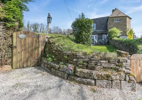 Farthings Cottage is lovingly preserved with original features, including exposed stone walls & timber beams