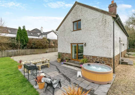 The patio, barbecue, alfresco dining area & hot tub at Fern Gully, Chilla