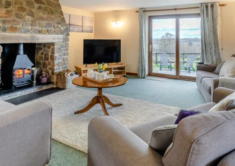 Fern Gully, Chilla is a beautifully presented four-bedroom Devon cottage complete with a crackling wood burner, private hot tub, and games room. Ideally placed for families and couples eager to explore the coast, countryside, and Dartmoor.