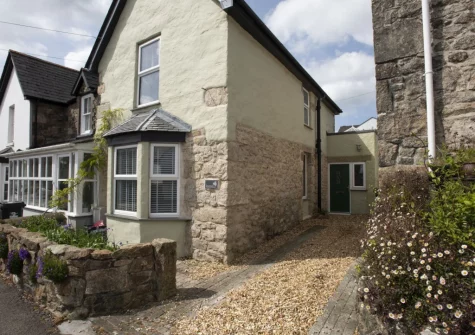 Fernbank is a refurbished boutique cottage in Lelant, set over two floors, with a lovely mature garden, beautiful interiors & parking