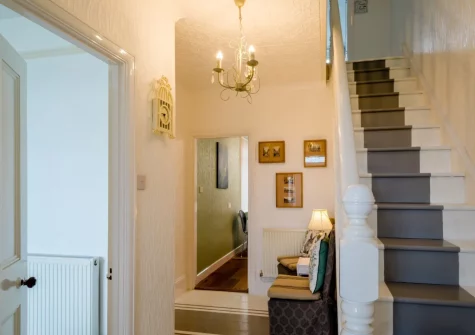The hallway & stairs up to the first floor at Fernlea, Appledore