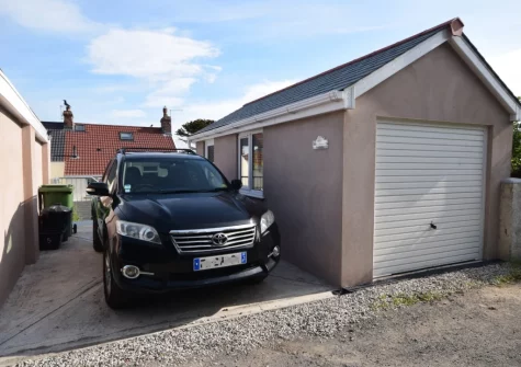 Private parking space is available next to the garage games room