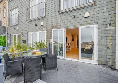 The decked terrace & alfresco dining area at Fernlea Court, St Ives