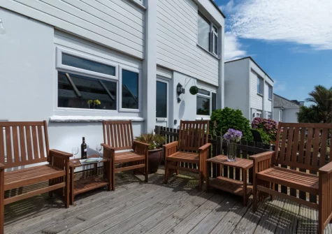The decked patio, barbecue & outdoor sitting area at Fiddlers Green, Newquay